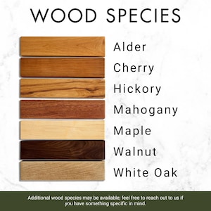 a collection of different types of wood, each with its own unique color and texture, arranged in a vertical line.
