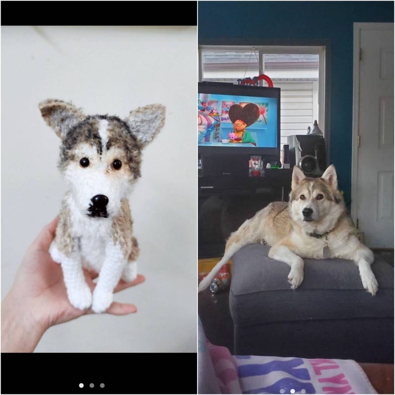 May include: A small, handcrafted crochet dog figurine featuring a mix of white, tan, and dark gray yarn. The plush toy has pointed ears, a white muzzle, a black nose, and dark eyes, designed to resemble a husky-type dog with a seated posture.