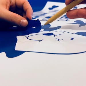 Close up of Vinyl Wall Sticker being weeded ready for despatch