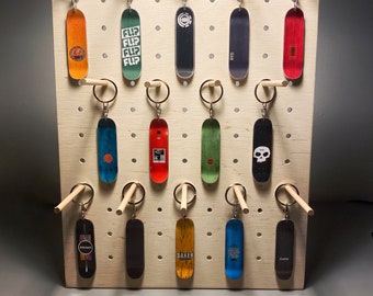 Portachiavi da skateboard - replica di vere tavole da skateboard in metallo.