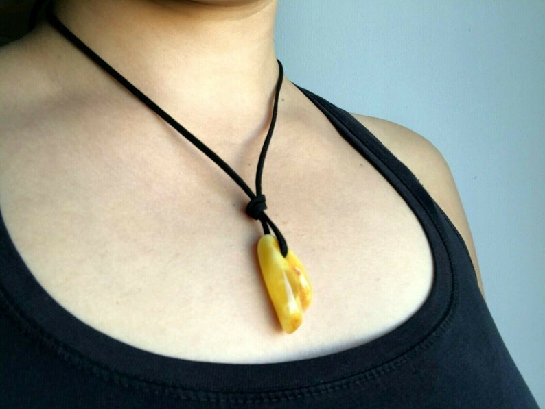 AMBER PENDANT Polished Yellow Egg Yolk Opaque Bead on Black Cord Unisex Jewelry 4g 11666