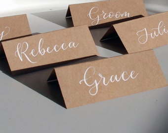 Rustic kraft paper place setting, hand written with beautiful calligraphy, perfect for any occasion. Handmade, unique