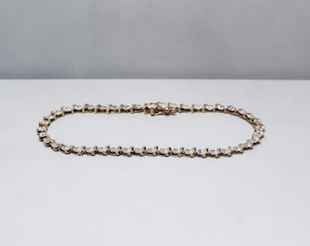 9ct yellow gold wave bracelet with diamonds inset, length of bracelet 7 inches