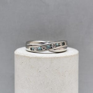 Silver Twist ring with Blue and White Cubic Zirconia&#39;s. Finger size K