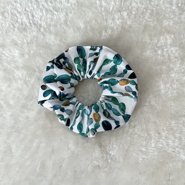 White and green scrunchie with cactus patterns