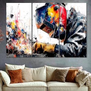 May include: Abstract artwork depicting a welder at work, with vibrant splashes of color. The welder is wearing a helmet and protective gear. The artwork is divided into three panels, creating a dynamic and artistic representation of the welding process.