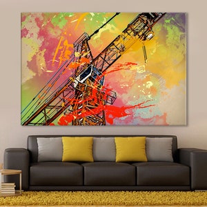 May include: Abstract painting of a construction crane with splashes of red, yellow, and blue paint on a yellow, green, and pink background.