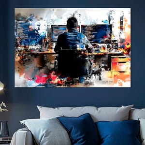 May include: Abstract art print depicting a person working at a computer desk. The artwork shows a person facing away from the viewer, seated before multiple computer monitors displaying code. The colour palette includes blues, oranges, and whites.