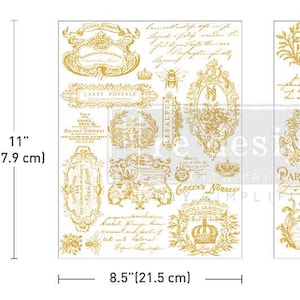 May include: Two sheets of gold-colored decorative transfers with vintage-style designs. The sheets measure 8.5 inches by 11 inches. The designs include crowns, ornate frames, and script text. The text includes the words "Paris" and "Montpellier".
