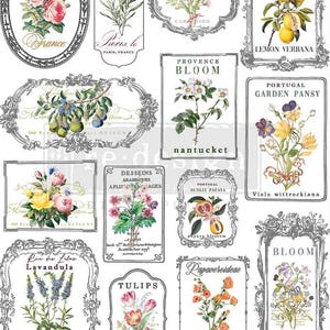 May include: A sheet of decorative floral transfers with various botanical illustrations, including roses, lavender, and lemons. The sheet measures 11 inches (27.9 cm) high and 8.5 inches (21.5 cm) wide, featuring text such as "Provence Bloom" and "Tulips".