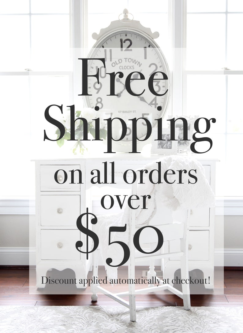May include: White vintage-style desk with a white chair and a white clock with the text "Free Shipping on all orders over $50" and "Old Town Clocks 67 Bailey St."