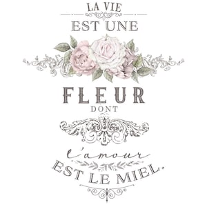 May include: A vintage-style floral design with the text "La Vie Est Une Fleur Dont L'amour Est Le Miel." The design features pink roses and ornate scrollwork.
