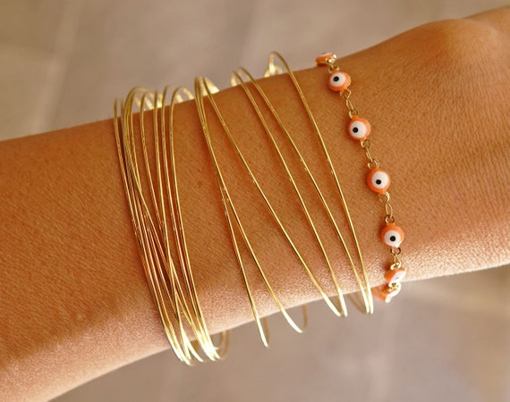 Gold Off White Women Bangles Bracelets Accessorize - Buy Gold Off White  Women Bangles Bracelets Accessorize online in India