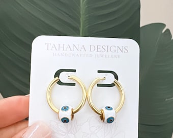 Aros dorados con forma de ojo malvado: acero inoxidable hipoalergénico, 2,5 cm