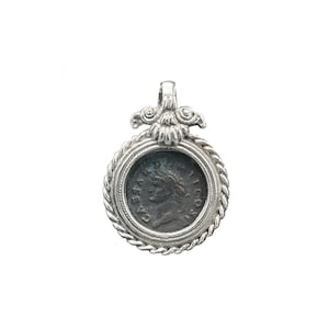 Roman bronze coin depicting Emperor Domitian (1st cent. AD) set in a sterling silver pendant