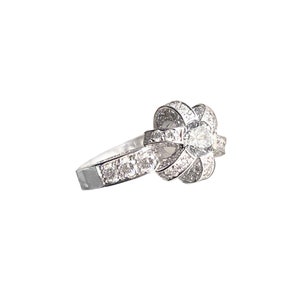 Engagement ring in 18 kt white gold with central diamond G color 0.50 cts and 1.23 cts of pavè brilliants