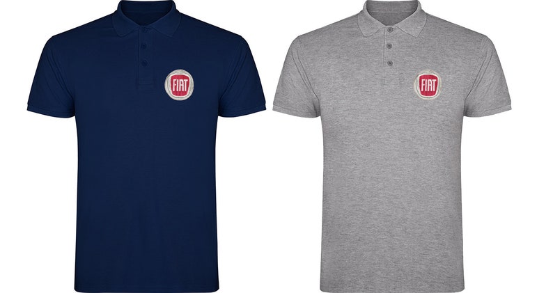 May include: Two polo shirts with the Fiat logo embroidered on the left chest. The shirt on the left is navy blue and the shirt on the right is gray.