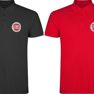 May include: Two polo shirts with the Fiat logo embroidered on the left chest. The shirt on the left is black and the shirt on the right is red.