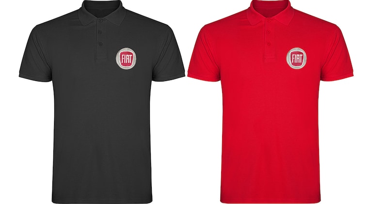 May include: Two polo shirts with the Fiat logo embroidered on the left chest. The shirt on the left is black and the shirt on the right is red.