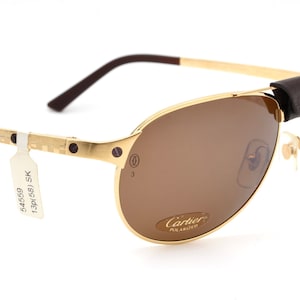 Cartier edition santos dumont 130 clearance