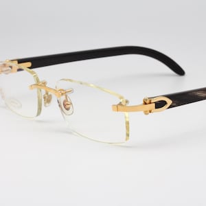 Lunettes de vue vintage Cartier Arizona en corne véritable, fabriquées en France, années 2000 - Neuf et d'occasion