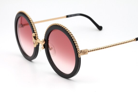 Christian LaCroix Sunglasses
Rate! Vintage Vintage Christian Lacroix Sunglasses, Green Red Frame, Gold  main image 3