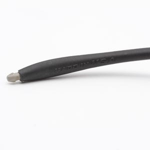May include: Close-up of a black rubber temple tip with the words "Made in USA" printed on it.