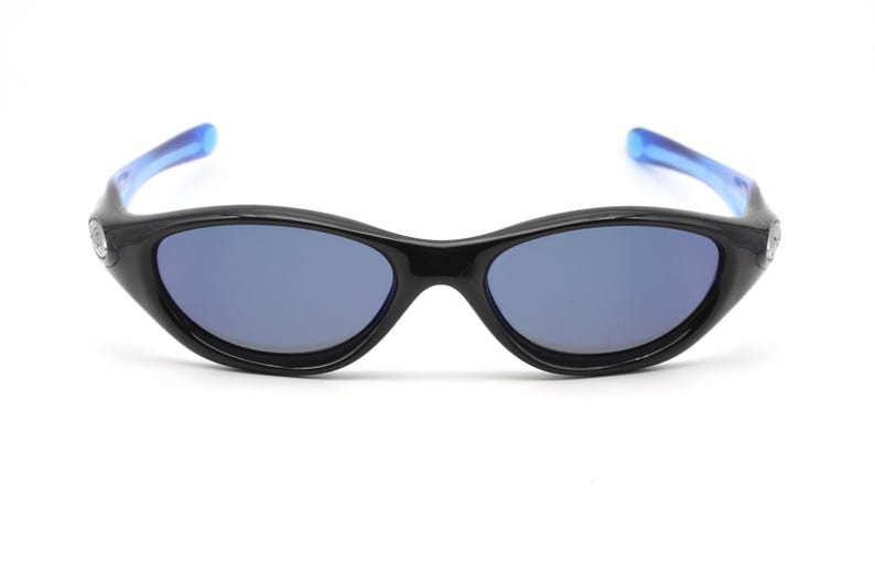 May include: Black sunglasses with blue arms and blue tinted lenses.