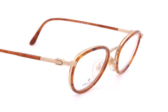 gucci tortoise frames