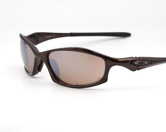 Солнцезащитные очки Oakley Juliet X Metal Plasma Iridium Silver