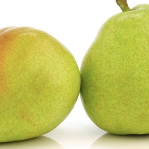 May include: Two pears, one with a green and yellow gradient and a red blush, the other a solid green. Both have stems and a textured skin. The pears are set against a white background.