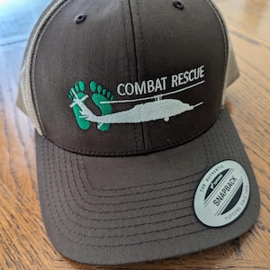Combat Rescue HH-60 Embroidered Snapback Trucker Cap | Helicopter Hat | Military Hat | Aircraft Hat | Green Feet | Jolly Green