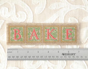 BAKE Patch: Embroidered Iron On Felt Applique (7x2 Inches)