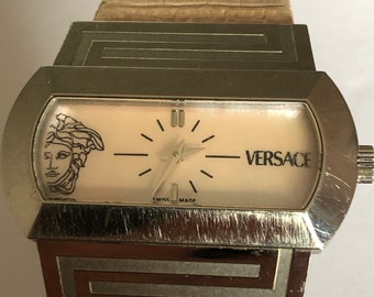 A vintage ladies Versace Wrist watch model PSQ 99