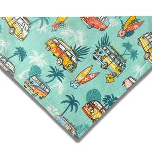 May include: A turquoise blue bandana with a pattern of colorful vintage vans, palm trees, and surfboards.