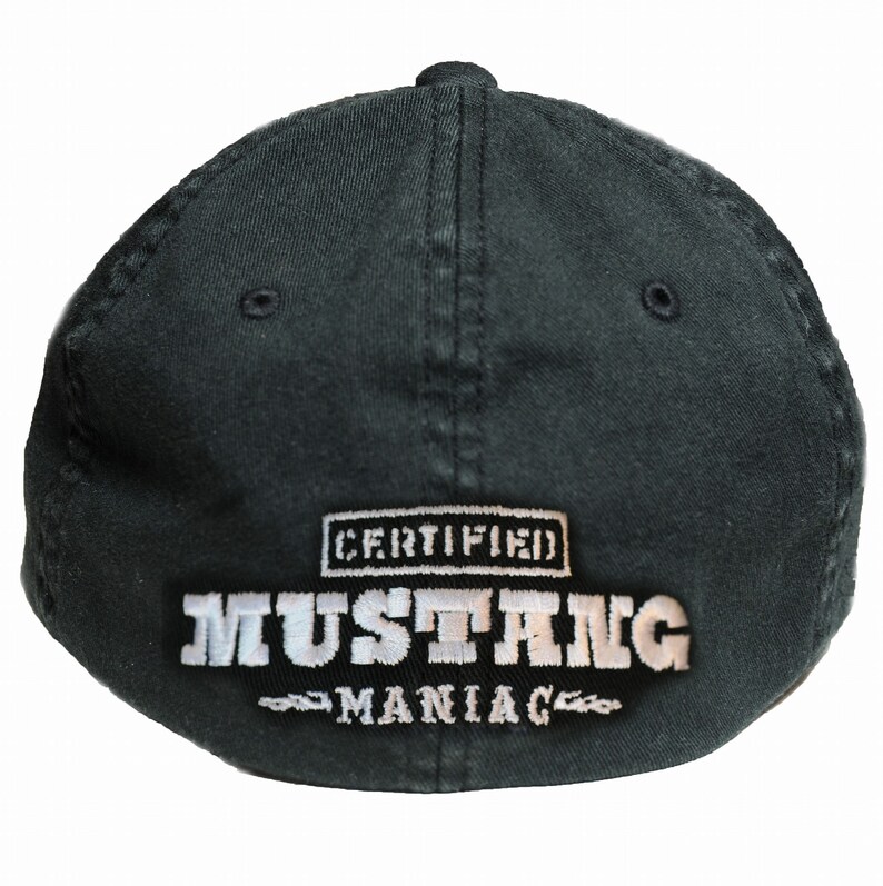 May include: Black baseball cap with white embroidered text that reads "CERTIFIED MUSTANG MANIAC".