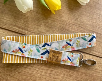 LENTEWEIDE • Lanyard Strepen Oker Mosterdgeel • Lanyard Strepen Mosterdgeel • Sleutelring Karabijnhaak Lentebloemen Weide