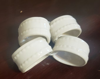 Set of 4 Ceramic napkin rings and matching Salt and Pepper set Ceramic