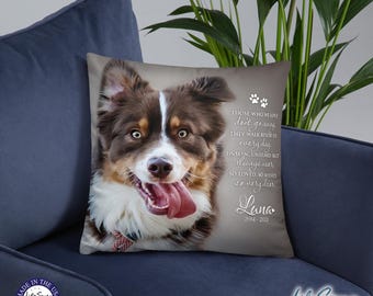 May include: Square decorative pillow featuring a close-up of a brown and white dog with its tongue out. The pillow has text that reads "Those who we love don't go away..." and the name "Lana" with dates. The pillow is on a blue chair.