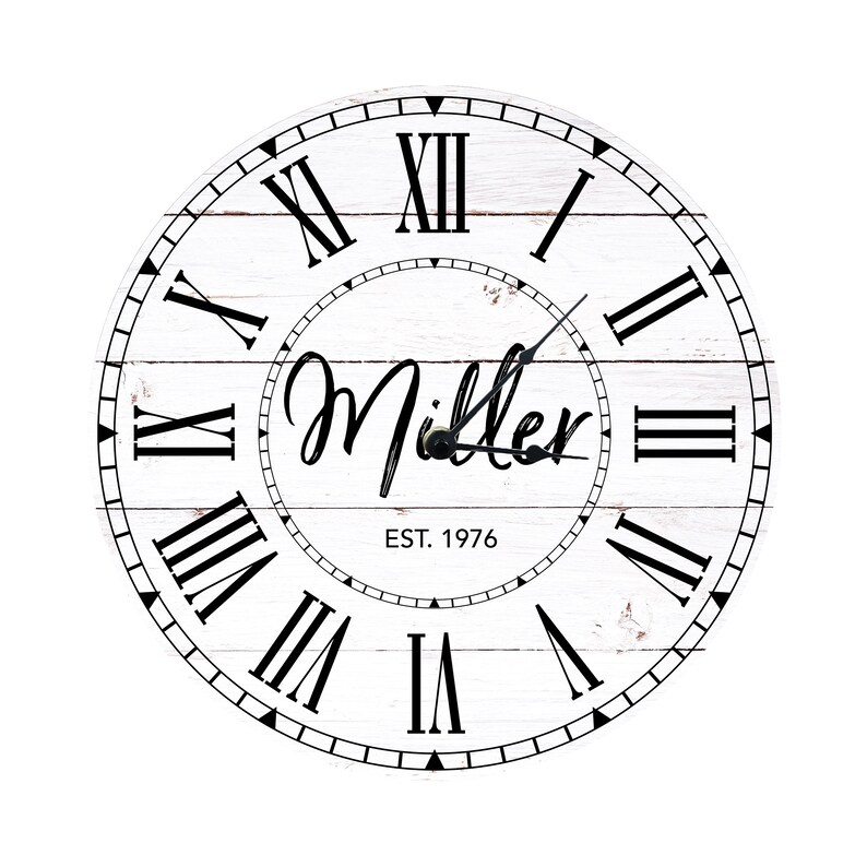 May include: White wooden clock with black Roman numeral hour markers and black hands. The clock face has a whitewashed woodgrain design and the text "Miller EST. 1976".
