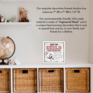May include: White framed shadow box with a baseball themed print that reads "And the child grew and became strong in spirit, filled with wisdom, and the grace of God was upon him."  The print is on a white wood background with red lettering. The frame measures 7 inches by 7 inches by 1.5 inches.