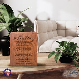 May include: A wooden plaque with a poem about remembering a loved one. The plaque is engraved with the text "In Loving Memory" and a poem about remembering a loved one. The plaque also includes the name "William Booth" and the dates "January 14, 1936 - May 2, 2018".