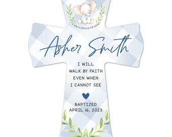 May include: A cross-shaped baptism keepsake with a blue gingham pattern. It features an illustration of an elephant, the name "Asher Smith", and the text "I WILL WALK BY FAITH EVEN WHEN I CANNOT SEE". The date "APRIL 16, 2023" is also included.
