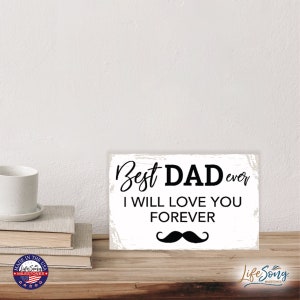 May include: White wooden sign with black text that reads "Best DAD ever I WILL LOVE YOU FOREVER" with a black mustache underneath. The sign has a distressed, vintage look.