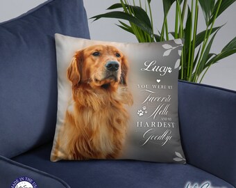 May include: A beige throw pillow with a golden retriever dog image and the text "Lucy You were my Favorite Hell and my Hardest Goodbye".