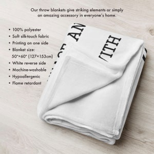 May include: White throw blanket with black text that reads "LIFE IS BETTER WITH AN A" and a black stripe along the bottom edge. The blanket is made of 100% polyester and is machine washable. It measures 50 inches by 60 inches (127 cm by 153 cm).