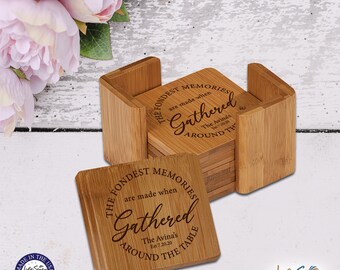 May include: Set of six bamboo coasters with a holder. The coasters are engraved with the text "The fondest memories are made when gathered around the table." The text also includes the family name "The Avinas" and the date "Est 7.20.20".