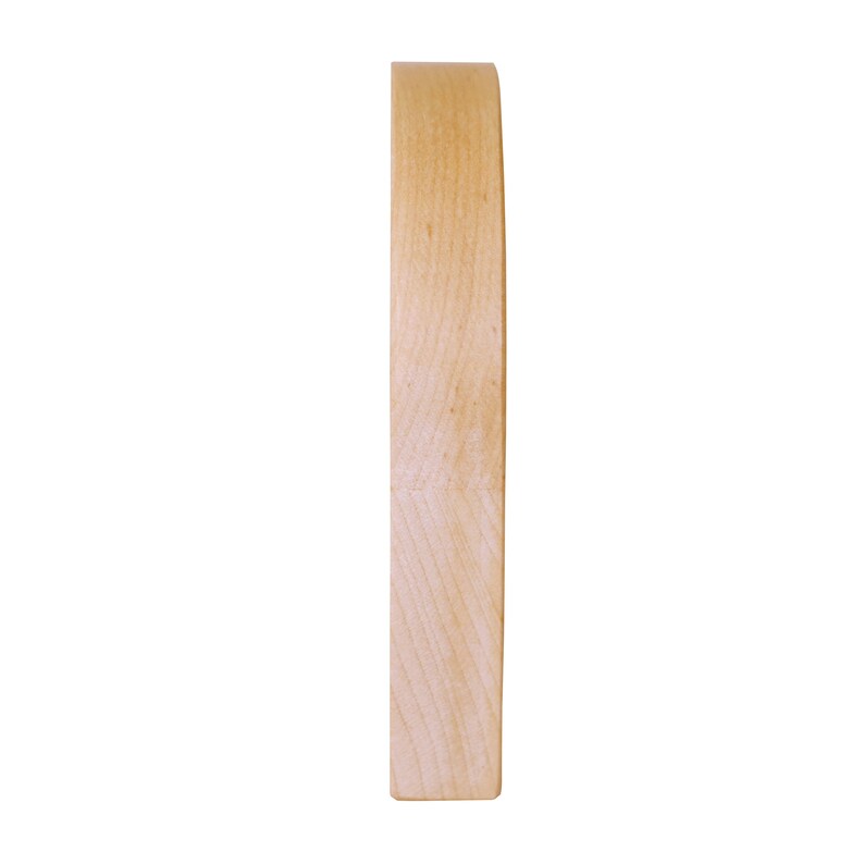 May include: Side view of a round wooden cutting board. The board is made of light wood and has a smooth surface.