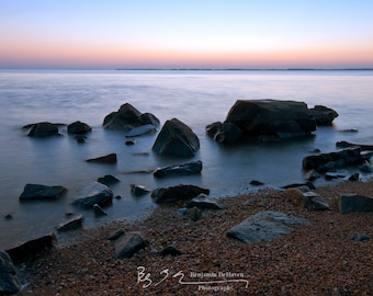A peaceful morning on the Chesapeake Bay from Sandy Point State Park. Sky over the horizon and a tranquil blue hue.