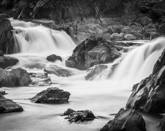 A black and white shot of a couple waterfalls on the Potomac River in Great Falls National Park on the border between Maryland and Virginia.